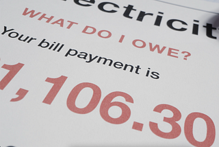 This is a picture of a utility bill. It says “What do I owe?” and has a large amount in big read numbers.