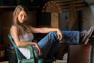 Farm girl in jeans and white t shirt