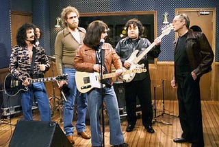 The most-quoted, most viral Saturday Night Live skit of the past 50 years? More Cowbell. Above: Chris Kattan, Will Ferrell, Chris Parnell, Horatio Sanz, and Christopher Walken (Jimmy Fallon played the drums in the background. The skit aired on April 8, 2000. Photo by Mary Ellen Matthews/NBC/NBCU Photo Bank.