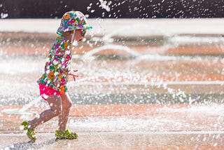 a child playing in cool water in the summer. breasts, weather, this happended to me