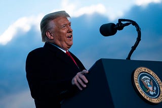 Outgoing president Donald Trump addressing guests from a podium on Jan. 20, 2021.