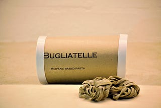 Container of bugliatelle, pasta made from insects