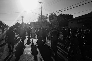 Activists march through the streets of Minneapolis in protest of police brutality following the killing of George Floyd