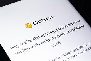 In this photo illustration, the message “Hey we’re still opening up but anyone can join with an invite from an existing user!” for Clubhouse’s waitlist is seen displayed on a smartphone screen