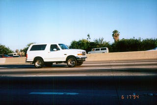 The infamous white Ford Bronco with suspects O.J. Simpson and Al Cowlings in a car chase in Southern California, SR-91, on June 17, 1994 as seen by Jimmy Wong (photo copyright from Jimmy Wong)
