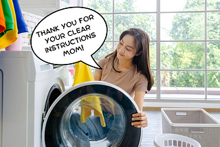Young woman putting clothes into a clothes dryer with a thought bubble with the text “Thank you for for your clear insturctions mom!”