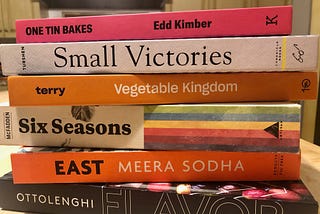 A stack of cookbooks from the author’s personal collection.