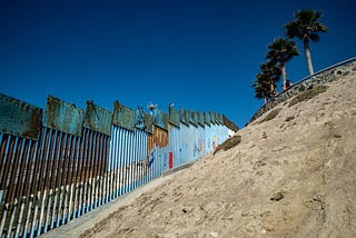 A Portrait of the Beach That Divides Us