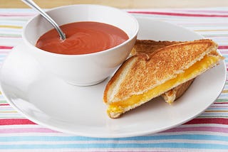Grilled cheese sandwich and tomato soup.