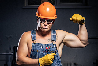 man-in-helmet-posing-and-showing-off-muscles