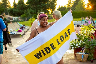 Plus size woman at a pool party