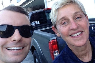 A smiling selfie of the author with Ellen DeGeneres