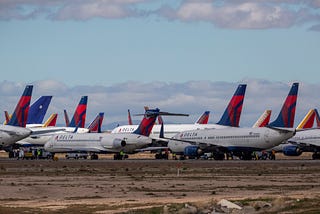 A fleet of Delta Airlines jets parked at the Southern California Logistics Airport (SCLA) due to decreased air travel.