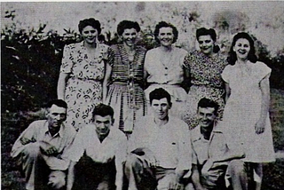 A family picture from the 1940’s featuring author’s grandmother and her eight siblings