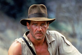 Indiana Jones holds a sword