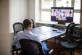 Manager on a video call with his team.