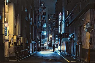 Dark empty city street at night, save for a lone dark figure.