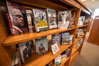 A black history book display at a library.
