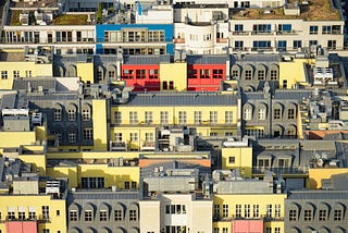 An aerial view of residential and office buildings on a city block in Berlin, Germany.