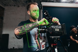 Cameraman with green lines overlay