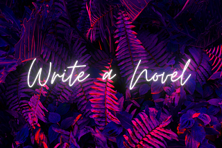 Picture of funky colored leaves (pink and purple) with the text “Write a Novel” overlaid on top of it.