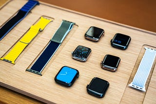 A photo of a disassembled Apple watch on display at a store.