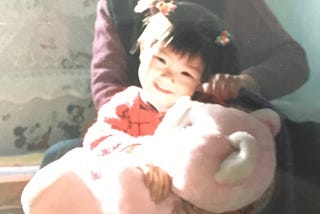 A photo of the author as a child with her grandmother.