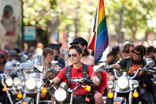 Historic Photos Give Us A Glimpse Back at 50 Years of Pride Parades