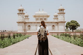 A traveler in front of the Tomb of I’timād-ud-Daulah, “the baby Taj Mahal.”