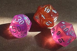 3 polyhedral gaming dice for playing Dungeons and Dragons
