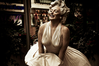 A statue of Marilyn Monroe, in her iconic dress