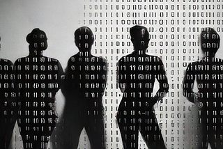 Black and white image of shadows of people in line with a pattern of ones and zeroes overlay.