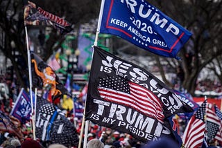 Trump supporters flying flags near the U.S. Capitol following the Stop the Steal rally on January 6, 2021 in Washington, DC.
