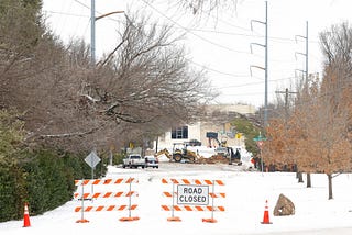 Road closure in Fort Worth, Texas, after the winter storm caused a pipe to break.
