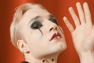 person-posing-in-art makeup