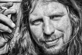 Image of a Ducth man with long blond hair ageed about 40