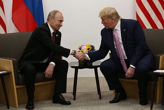 Russian President Vladimir Putin shaking hands with US President Donald Trump at the G20 summit in 2019.