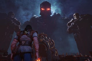 A giant magical forge monster with glowing red eyes looms over the player in Blades of Fire, flanked by two stone statues of himself.