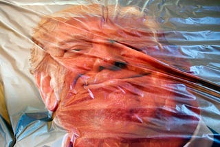 A big mat with a photograph of United States president Donald Trump