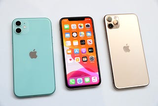 The new Apple iPhone 11 (L) and iPhone 11 Pro (R) are displayed during a special event on September 10, 2019