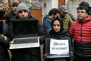 Kashmiri journalists protest against the continuous internet blockade for the 100th day outside of the Kashmir press club.