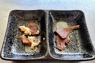 Thin slices of narezushi and heshiko.