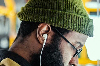 A man listening to headphones