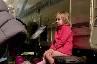 This girl and her extended family lived in a camper in Washington State.