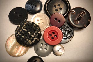 A collection of buttons of different types.