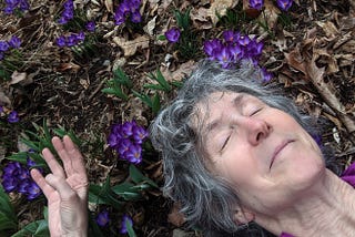 Woman Lying in a Field of Crocuses