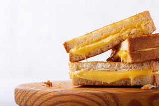 A close-up of a grilled cheese sandwich.