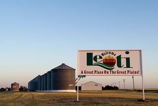 Color photo of a Welcome to Leoti sign at the edge of town
