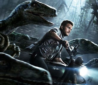 A man on a motorcycle rides amid a pack of velociraptors.
