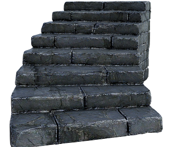 Set Of Grey Colored Stone Steps Leading To An Unknown Destination.